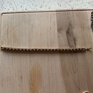 Elegant Gold and Red Bracelet